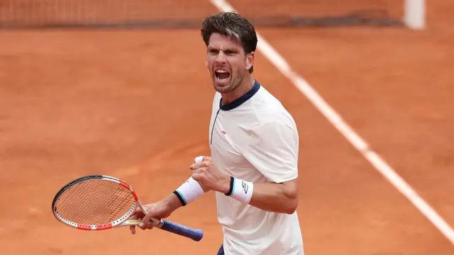 Cameron Norrie celebrates a point