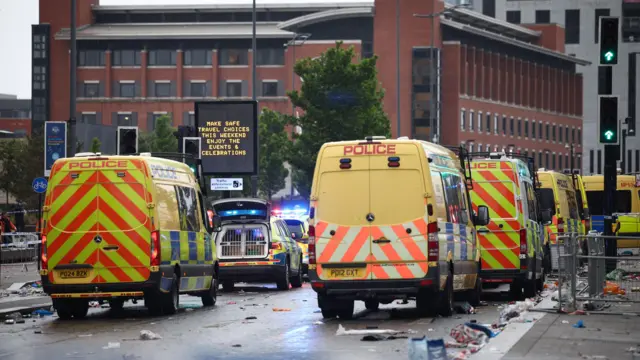 Police vehicles line up in Liverpool