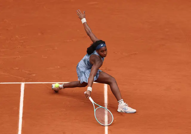 Coco Gauff of United States plays a backhand against Olivia Gadecki