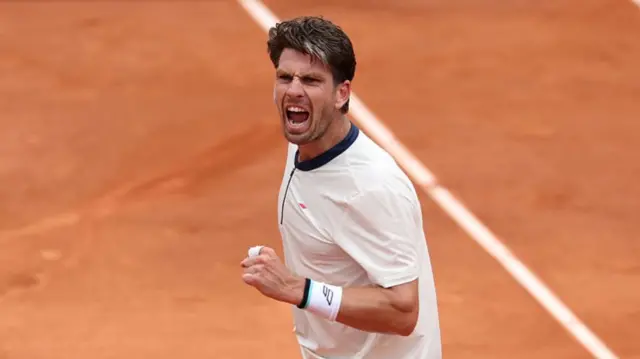 Cameron Norrie celebrates