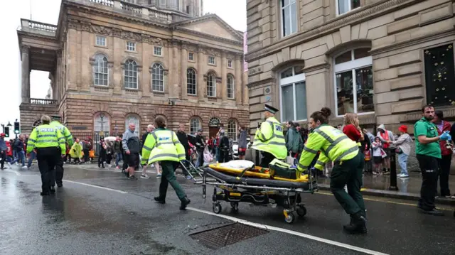 A large emergency service presence is pictured on Water Street after a car reportedly drives into the crowd during the Liverpool Trophy Parade on May 26, 2025 in Liverpool, England