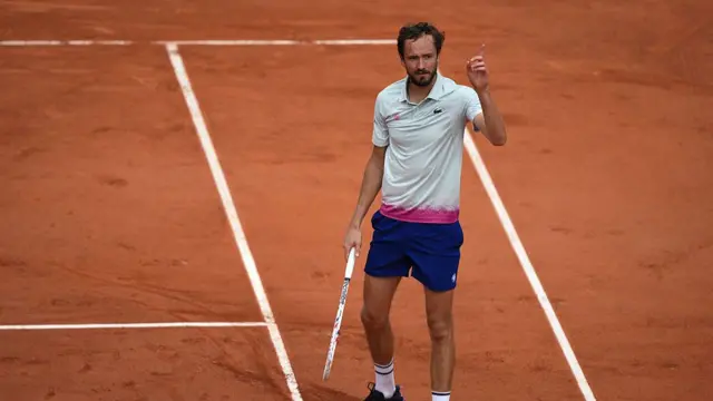 Daniil Medvedev gestures as he plays against Cameron Norrie