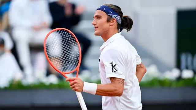 Mattia Bellucci celebrates a point