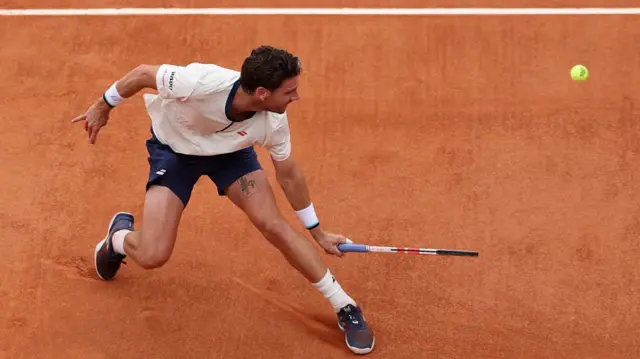 Cameron Norrie plays a backhand