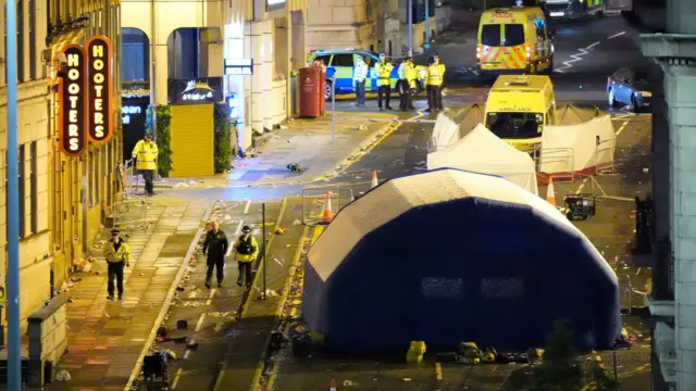 Police tent and tape up on Water Street