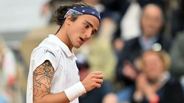 Mattia Bellucci reacts after a point