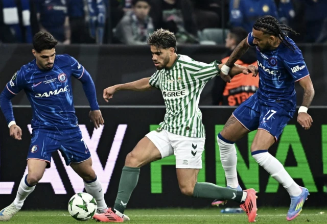 Chelsea's Pedro Neto and Malo Gusto in action with Real Betis' Abde Ezzalzouli