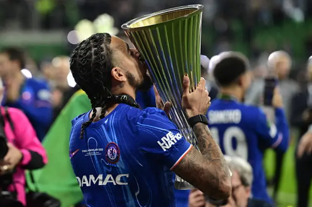 Malo Gusto kisses the trophy