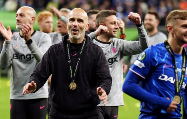 Chelsea manager Enzo Maresca applauds the fans