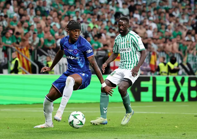 Noni Madueke of Chelsea controls the ball under pressure from Youssouf Sabaly