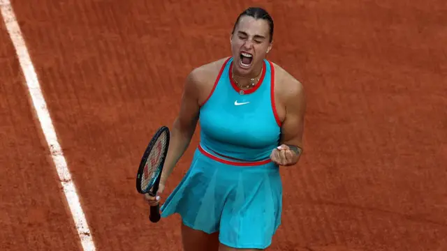 Aryna Sabalenka reacts after victory