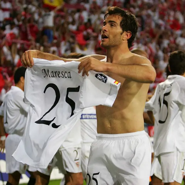 Enzo Maresca celebrates scoring a goal for Sevilla by holding up his shirt