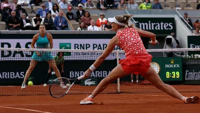 Jil Teichmann plays a forehand volley