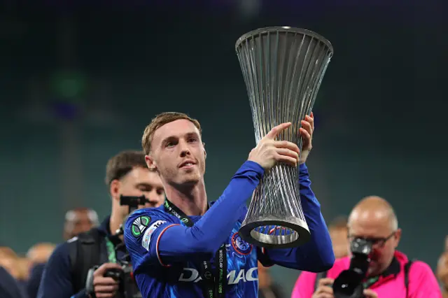 Cole Palmer of Chelsea lifts the UEFA Conference League Trophy