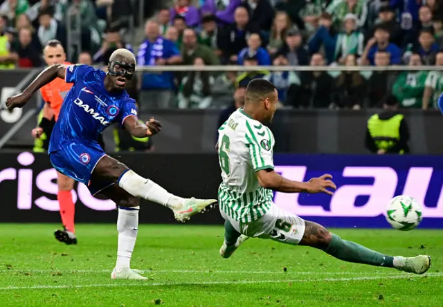 Moises Caicedo (L) scores
