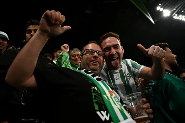 Fans of Real Betis pose for a photo