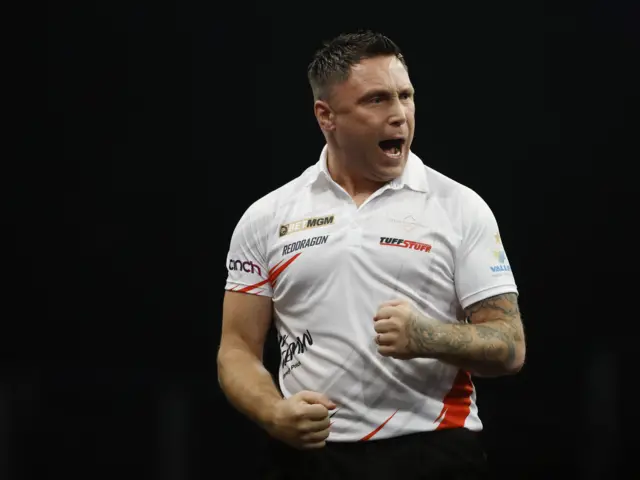 Gerwyn Price reacts during his semifinal match against Luke Littler