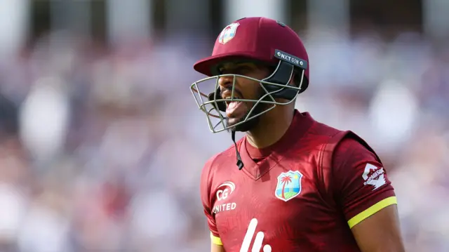 West Indies' Brandon King walks after losing his wicket