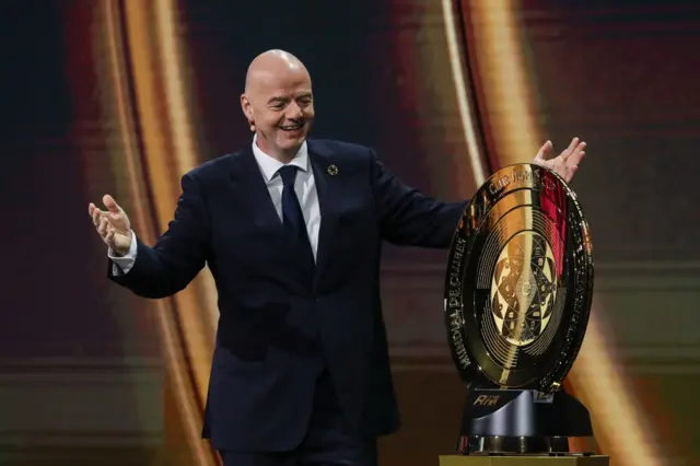 Gianni Infantino presents the Fifa Club World Cup trophy