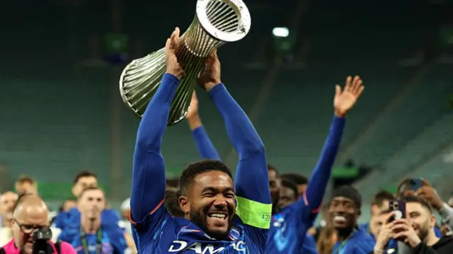 Reece James lifting the Conference League trophy for Chelsea
