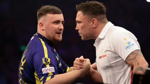 Luke Littler and Gerwyn Price embrace