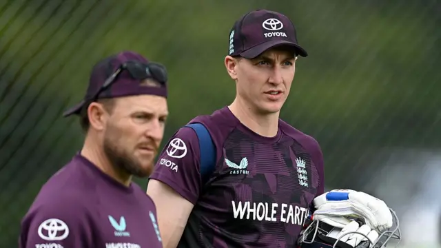 Harry Brook (right) with head coach Brendon McCullum