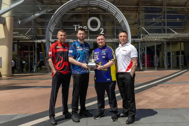 Nathan Aspinall, Luke Humphries, Luke Littler and Gerwyn Price outside the O2 Arena in London