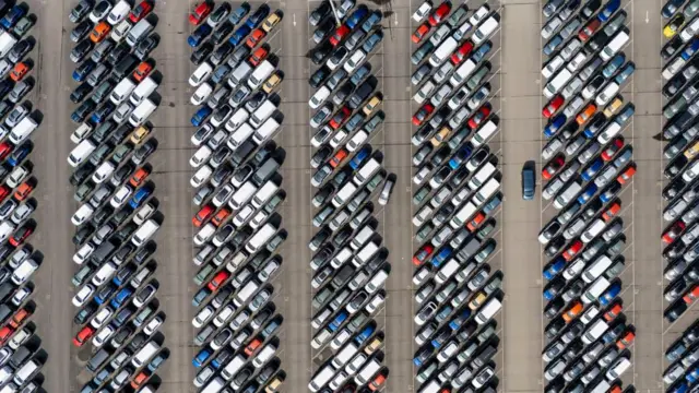 New cars at Royal Portbury Docks, North Somerset, as seen from above, with many cars parked in large long rows