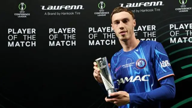 Cole Palmer with his Player of the Match trophy after Chelsea win the Conference League final