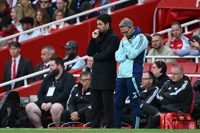 Mikel Arteta looks on