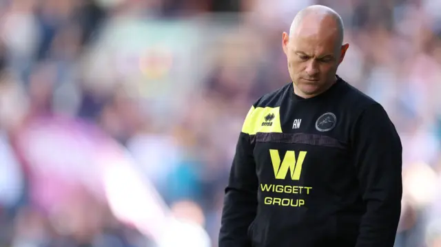 Millwall boss Alex Neil looks sad after missing out on play-offs
