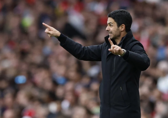 Arsenal manager Mikel Arteta looks on