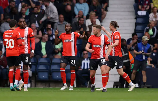 Millenic Alli celebrates
