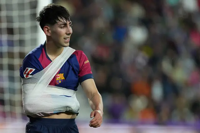Dani Rodriguez has his arm in a sling