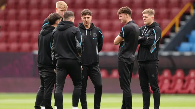 Millwall players on the pitch before kick-off at Burnley