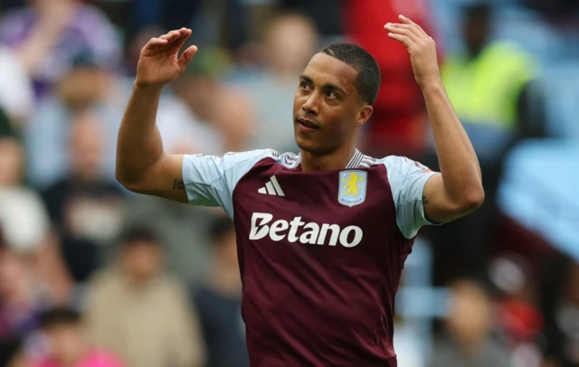 Youri Tielemans looks on