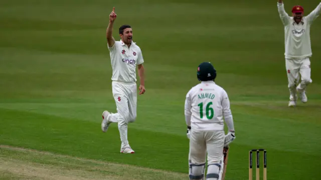Ben Sanderson celebrates taking wicket
