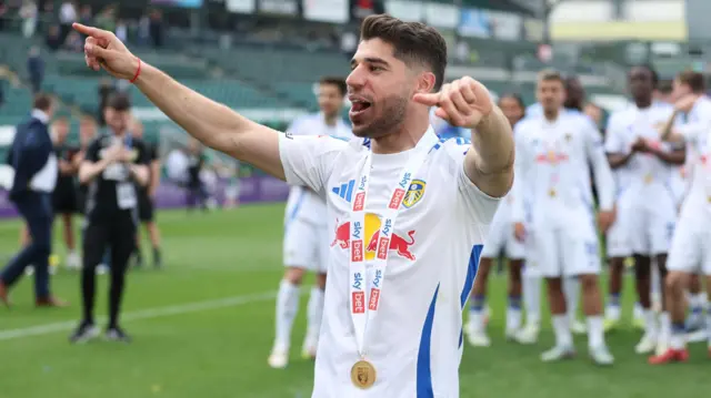 Manor Solomon celebrates after Leeds win the Championship