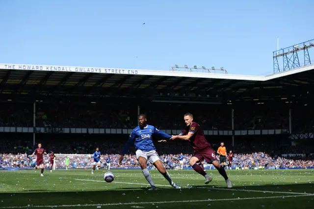Beto of Everton controls the ball whilst under pressure from Luke Woolfenden