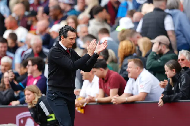 Aston Villa manager Unai Emery applauds the fans