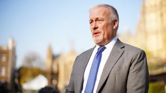 Shadow chief secretary to the treasury Richard Fuller reacts in Westminster, London