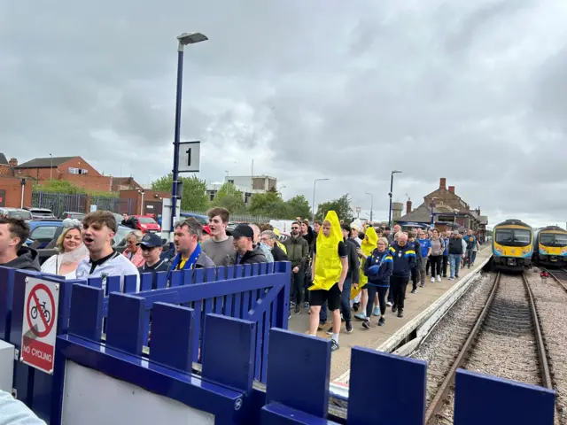 Wimbledon fans arriving at Grimsby