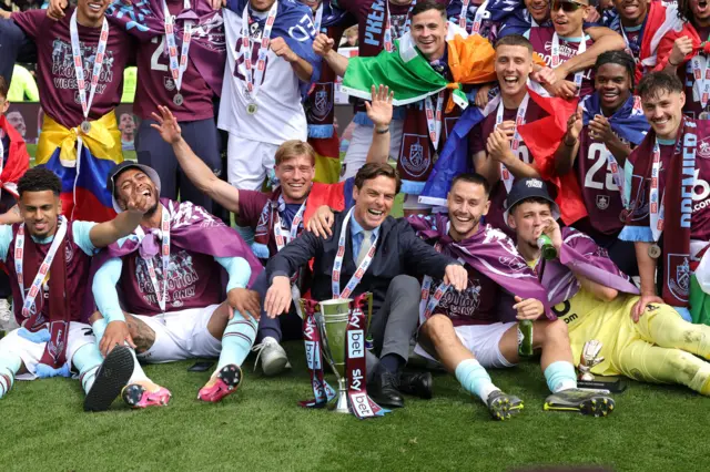Burnley players and boss Scott Parker celebrate promotion