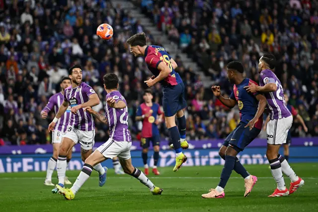 Pau Victor heads the ball against Real Valladolid