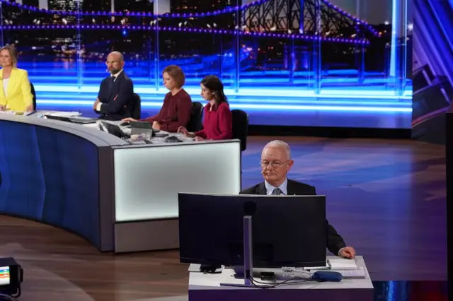 Antony Green pictured in front of a computer on set in Brisbane for the Queensland election night in 2024.