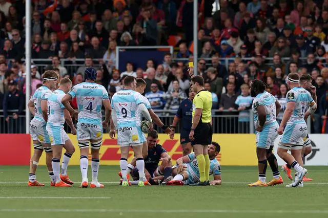 Edinburgh's Sam Skinner is shown a yellow card