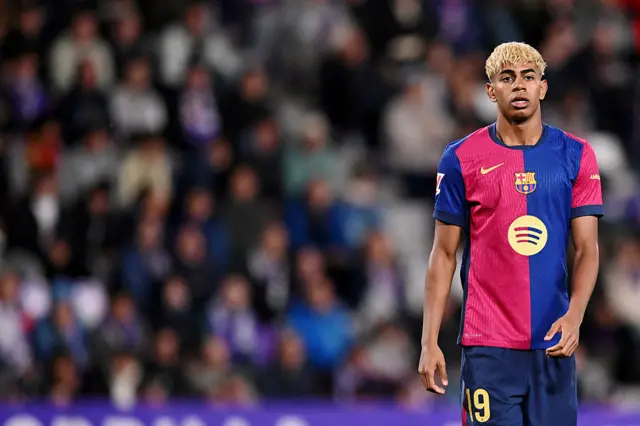 Lamine Yamal wearing a Barcelona shirt