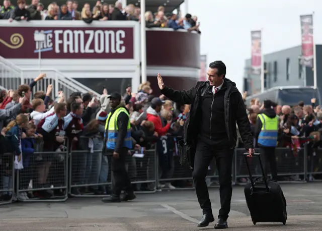 Unai Emery, Manager of Aston Villa, acknowledges the fans