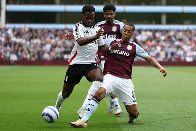 Youri Tielemans (R) tackles Fulham's English midfielder Ryan Sessegnon