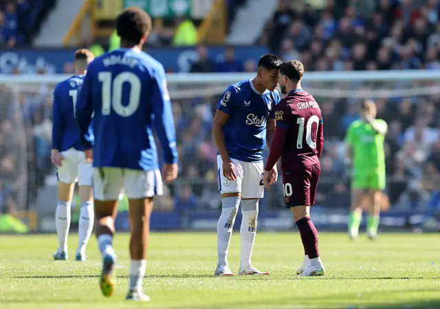 Carlos Alcaraz of Everton clashes with Conor Chaplin